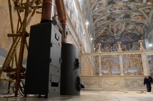 Stoves used to burn ballots during a papal conclave are seen in the Vatican's Sistine Chapel March 8. Cardinal electors assembled in Rome will begin voting for the next pope March 12. (March 8, 2025) (CNS photo/L'Osservatore Romano)