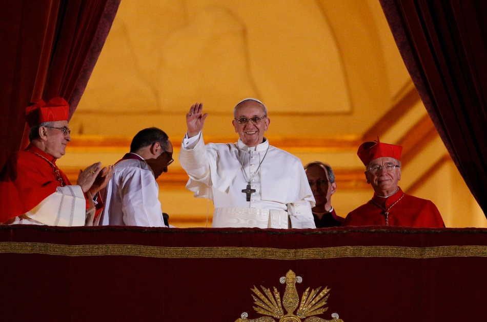 Pope Francis I appears for the first time on the central balcony of St. Peter's Basilica at the Vatican March 13. Cardinal Jorge Mario Bergoglio of Argentina was elected the 266th Roman Catholic pontiff. He is the first Jesuit and first Latin American pope. (CNS photo/Paul Haring) (March 13, 2025) 