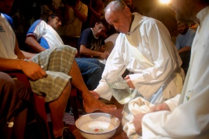 Argentine Cardinal Jorge Mario Bergoglio washes the feet of residents of a shelter for drug users during Holy Thursday Mass in 2008 at a church in a poor neighborhood of Buenos Aires, Argentina. The 76-year-old Jesuit became the first Latin American pope March 13, taking the name Francis. (CNS photo/Enrique Garcia Medina, Reuters) (March 15, 2025) 