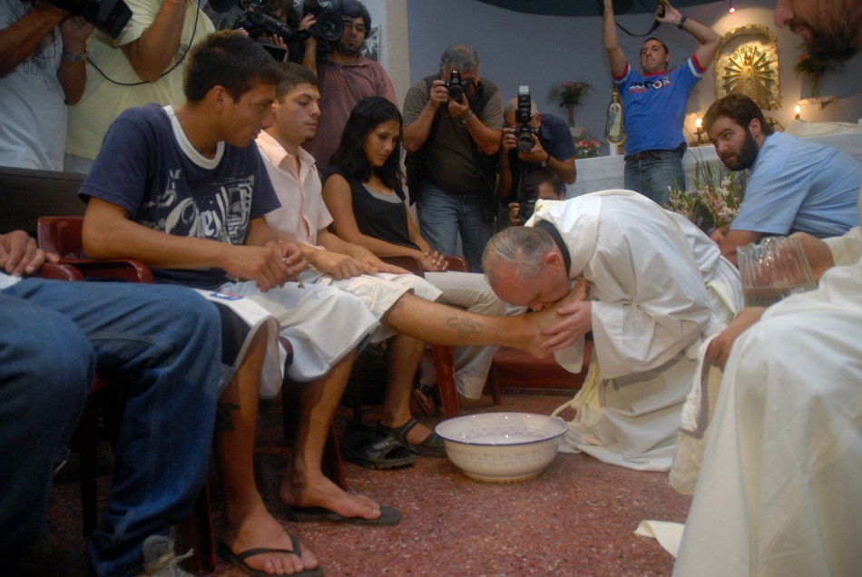 Argentine Cardinal Jorge Mario Bergoglio washes and kisses the feet of residents of a shelter for drug users during Holy Thursday Mass in 2008 at a church in a poor neighborhood of Buenos Aires, Argentina. The 76-year-old Jesuit became the first Latin American pope March 13, taking the name Francis. (CNS photo/Enrique Garcia Medina, Reuters) (March 15, 2025) 