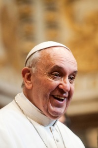 Pope Francis smiles during his audience with the Vatican diplomatic corps in the Sala Regia of the Apostolic Palace. (CNS photo/Alessia Giuliani, Catholic Press Photo) 