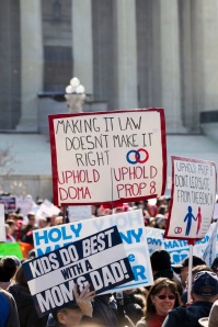 People demonstrate outside the Supreme Court building in Washington March 26 as justices hear arguments in a case challenging California's same-sex marriage ban, the 2008 voter-approved ban known as Proposition 8. The next day the justices were to hear arguments in a case involving the Defense of Marriage Act, which defines marriage as "a legal union between one man and one woman as husband and wife." (CNS photo/Nancy Phelan Wiechec) (March 26, 2025)