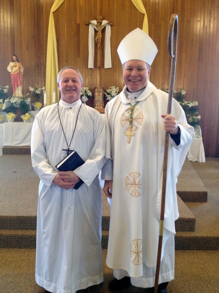 Ron Mathews—deacon candidate—stands with Bishop Edward Burns after Mathews’ installation as lector at St. Gregory Nazianzen’s in Sitka  during the Bishop’s Pastoral visit to the parish on Sunday, April 7th. 