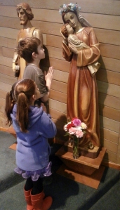 Children from Holy Name Parish in Ketchikan participate in the 'crowning of Mary' on May 1st. The Church officially dedicates the month of May to Mary the Mother of God.