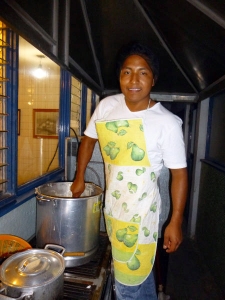 Alberto, mixing the masa (dough) for tamales.  Rotating teams of boys and girls plan and cook all meals as well as tamales, empanadas and pastries to be sold at fundraisers.