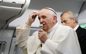 Pope Francis speaks to media aboard plane heading from Rio de Janeiro to Rome Pope Francis speaks to the media aboard the papal flight from Rio de Janeiro to Rome July 28. When the pope told reporters, "Who am I to judge" a homosexual person, he was emphasizing a part of Catholic teaching often overlooked by the media and misunder stood by many people. (CNS photo/Paul Haring)