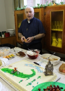 St. Gregory parish in Sitka welcomed Fr. Jim in February of 2012 with a custom cake of a bicyclist. 
