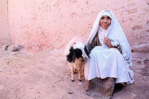Bibi Guhl received a lamb from CRS so she can earn income selling wool, milk and new lambs. Photo by Jennifer Hardy/CRS