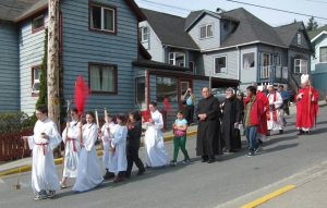 Parishioners of the Cathedral of the Nativity and of Holy Trinity  Episcopal join together for an outdoor Palm Sunday in downtown Juneau, April 13, 2025  procession