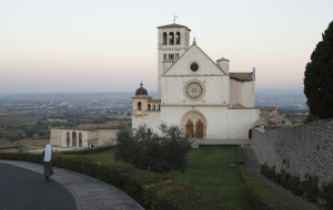 A nun walks near the Basilica of St. Francis in the early morning in 2011 in Assisi, Italy. Pope Francis will visit the birthplace of his namesake, St. Francis of Assisi, on the saint's feast day, Oct. 4. (CNS photo/Paul Haring) (May 23, 2025) See POPE-ASSISI May 23, 2013.
