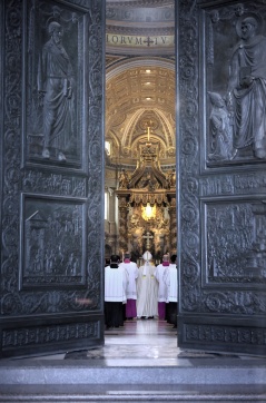 Pope Francis processes into St. Peter's Basilica to celebrate first vespers of Divine Mercy Sunday at Vatican
