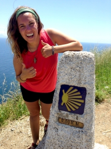 New diocesan Director of Youth Ministry, Heather Shaw, smiles at kilometer 0 of the Camino de Santiago de Compostela pilgrimage in Spain. Shaw walked the Camino last summer and calls it ‘one of the coolest experiences I’ve had so far!’ 