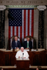 Pope Francis addresses a joint meeting of the U.S. Congress as Vice President Joe Biden (left) and Speaker of the House John Boehner look on in the House of Representatives Chamber at the U.S. Capitol in Washington Sept. 24. (CNS photo/Jim Bourg, Reuters) See POPE-CONGRESS Sept. 24, 2015.