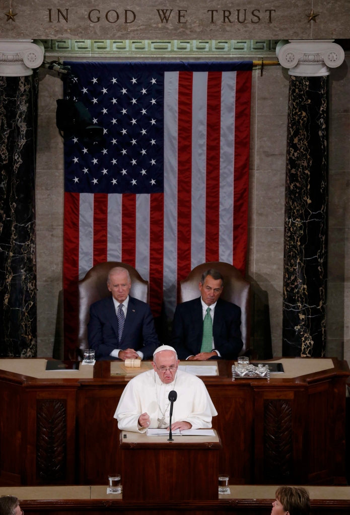 Pope Francis addresses a joint meeting of the U.S. Congress as Vice President Joe Biden (left) and Speaker of the House John Boehner look on in the House of Representatives Chamber at the U.S. Capitol in Washington Sept. 24. (CNS photo/Jim Bourg, Reuters) See POPE-CONGRESS Sept. 24, 2015.