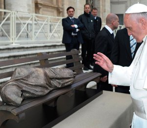 Pope Francis blesses a sculpture "Jesus the Homeless" at the Vatican last November. (CNS/L'Osservatore Romano)